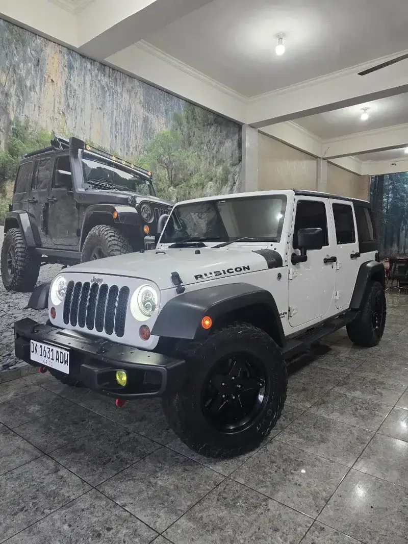 Jeep Wrangler Jk Sport tahun 2011 3.8 Facelif low Km 61rb - Vehicles in Bali