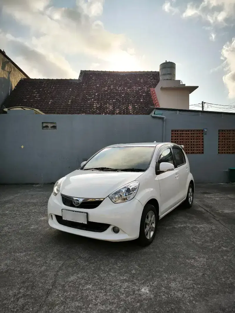 Daihatsu Sirion Putih 2014 Matic Tipe Tertinggi - Vehicles in Bali