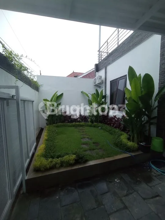 DISEWAKAN RUMAH BARU MINIMALIS 2 LANTAI DI JIMBARAN - Image 2 of 4