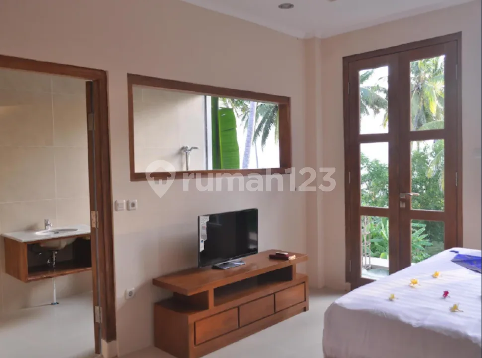 Family Room/Villa with Balcony and Direct Access to Beach â 36 sqm at Hotel Crystal Beach Bali (Karangasem, Candi Dasa) - Image 2 of 4
