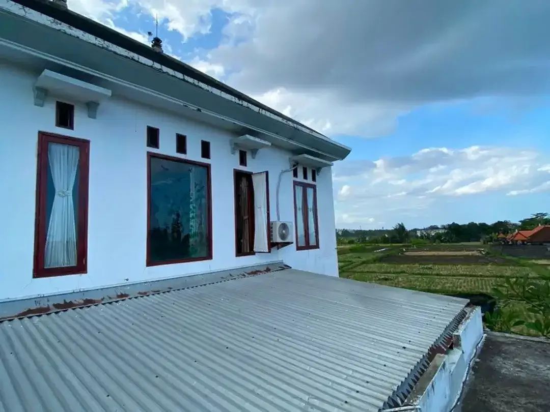 STUNNING 3-STOREY RESIDENCE WITH PANORAMIC OCEAN & RICE FIELD VIEWS - Image 4 of 10