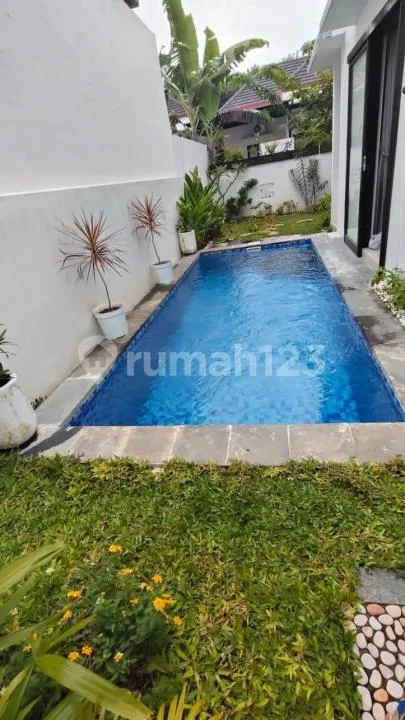 Rumah Modern With Pool Dalam Cluster di Kuta Selatan - Image 1 of 4