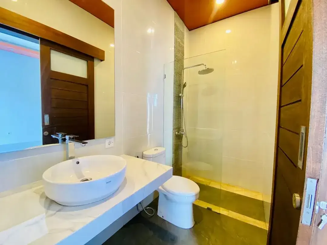 SANUR BEACHSIDE BRAND NEW DESIGNED VILLA OFFERS THE PERFECT BLEND OF MODERN COMFORT AND TROPICAL LIVING - Image 8 of 10