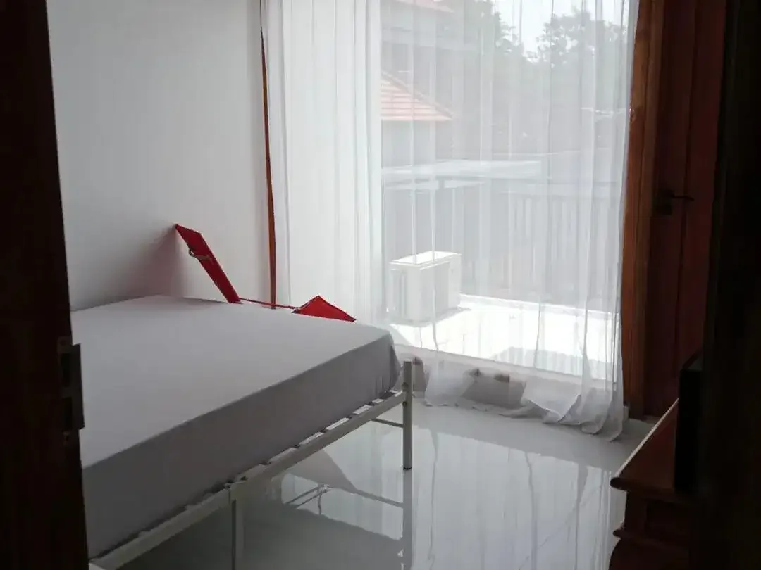 RUMAH MINIMALIS 2 LANTAI DI PERUMAHAN TUKAD PAKERISAN DENPASAR BALI - Image 9 of 10