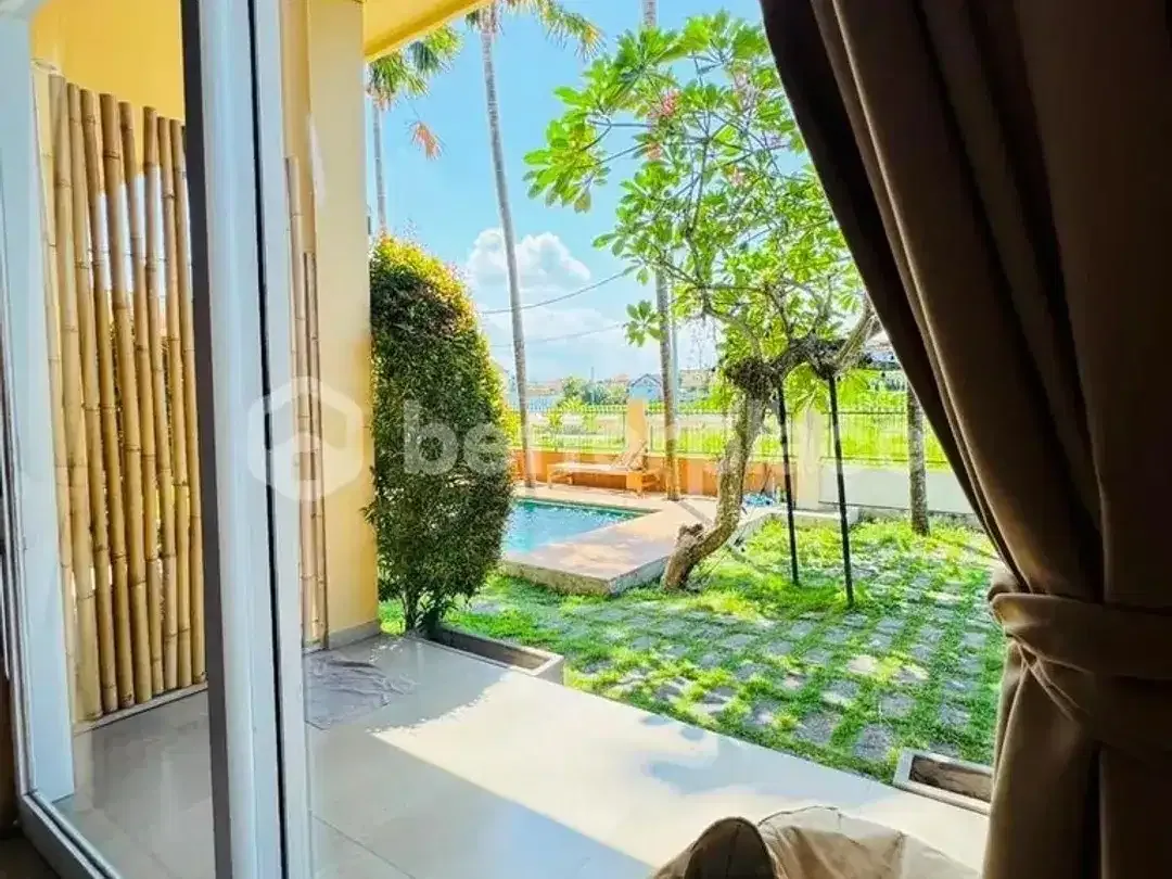 Elegant Leasehold Guesthouse in Canggu Babakan with Three Rooftop Joglo Rooms, Open Living Spaces, Rice Field Views and Prime Location - Image 3 of 10