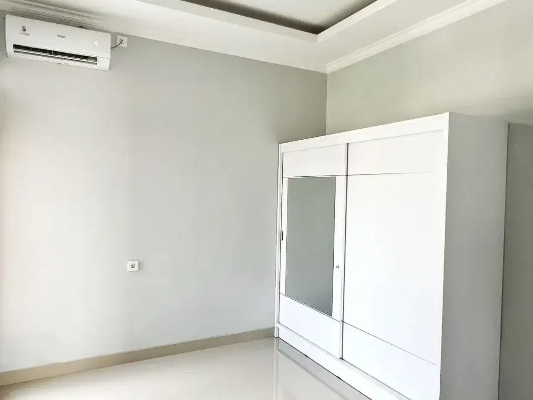 Hunian Modern Minimalis untuk Keluarga di Pusat Kota - Image 10 of 10