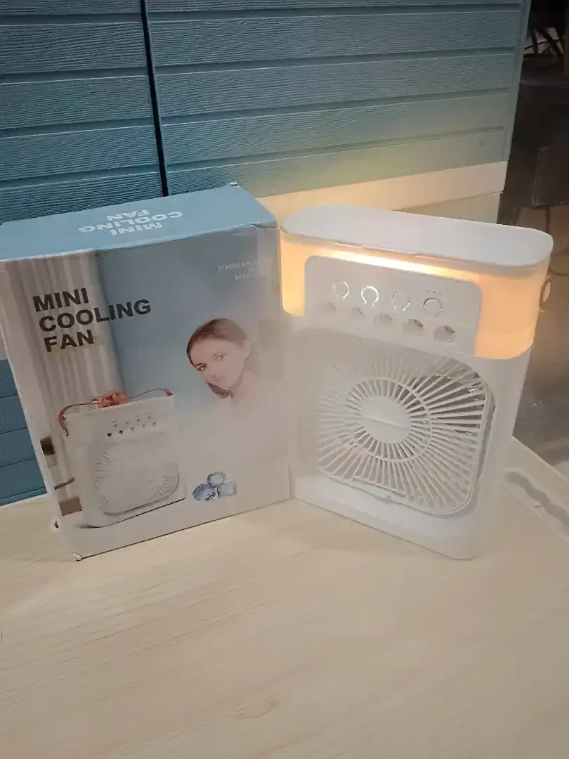 Kipas Mini Ac Portable Air Cooler Fan 10W Uk. 18x7x24cm Ada 3kecepatan - Image 1 of 10